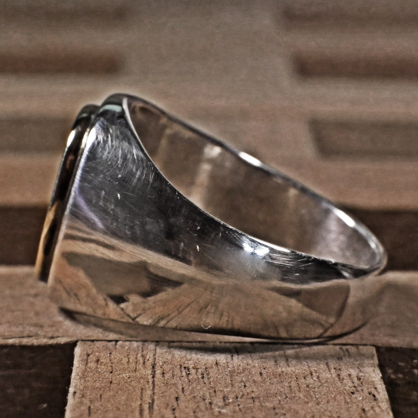Semi polished brass face simple monogram silver ring