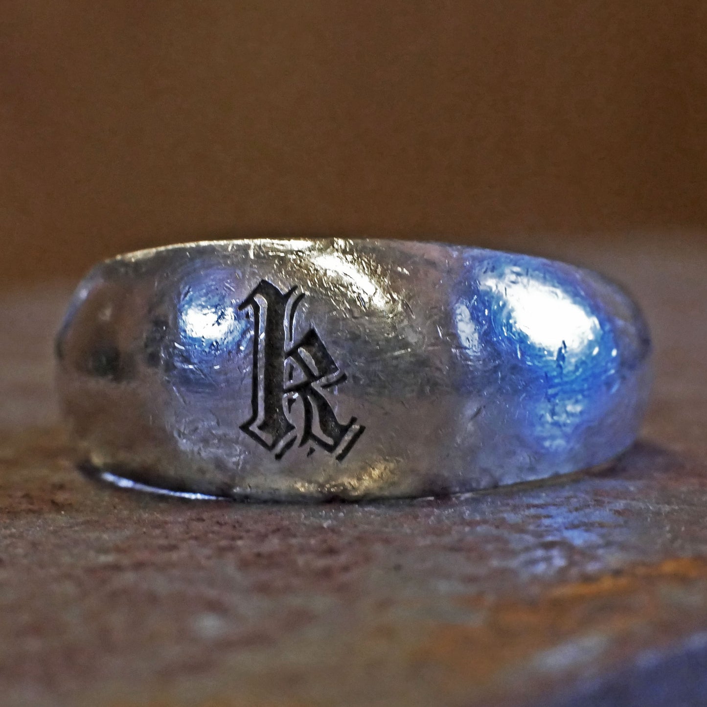 RS-191 Embossed Black font single initial engraved rustic silver ring